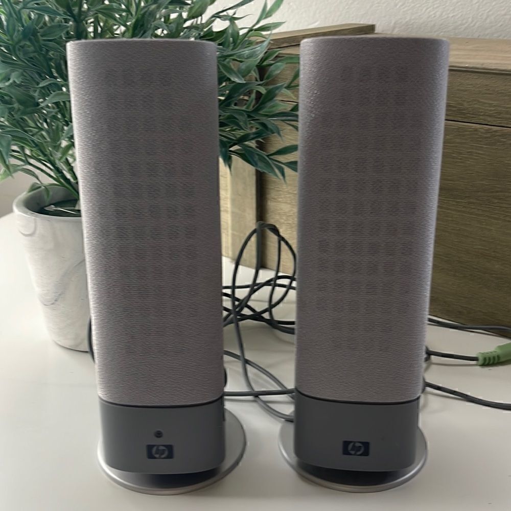 Hewlett-Packard portable speakers.   